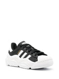 N372O adidas
Superstar chunky-sole leather sneakers